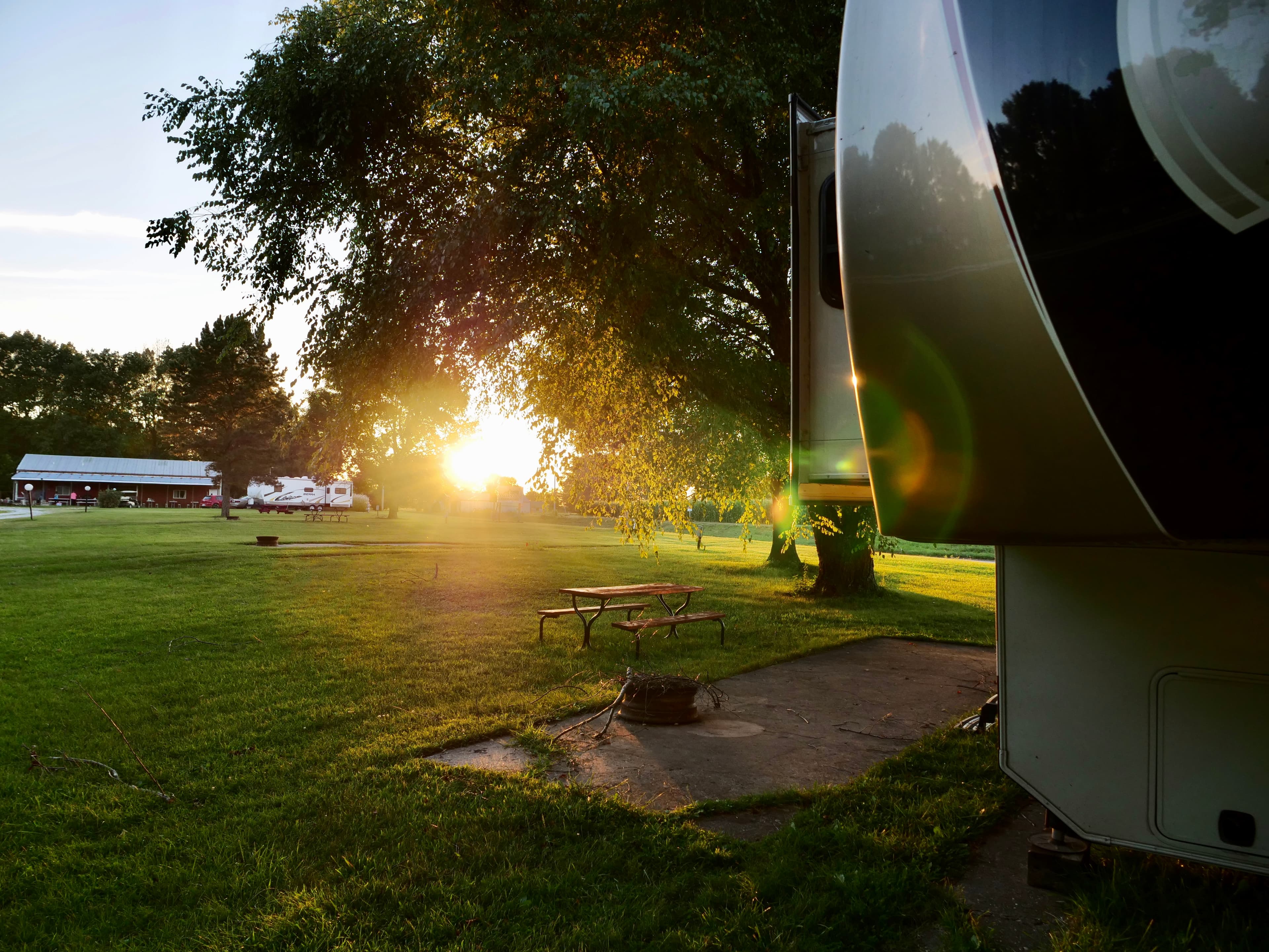 A camper at sunset