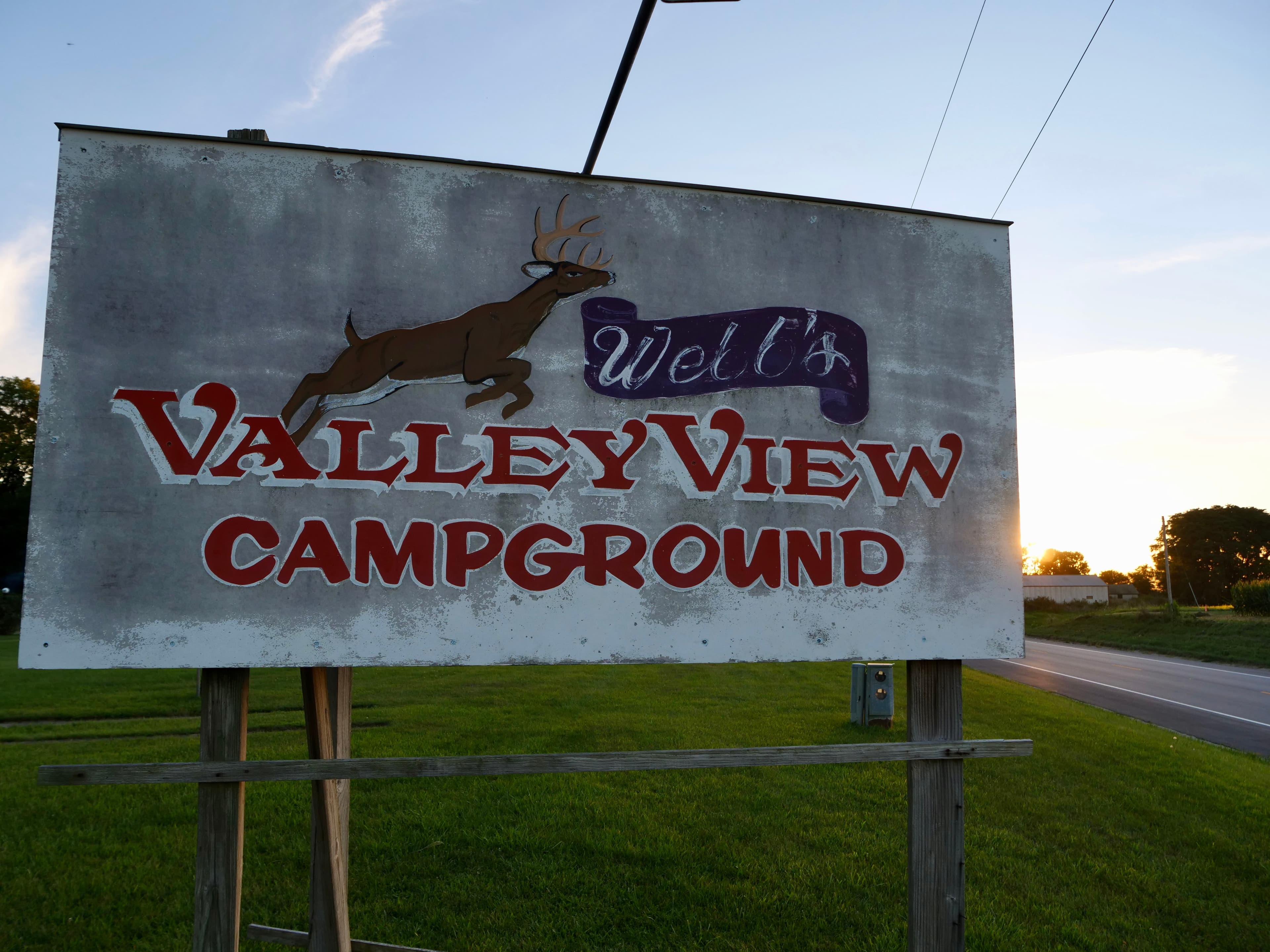Background image showing campground scenery